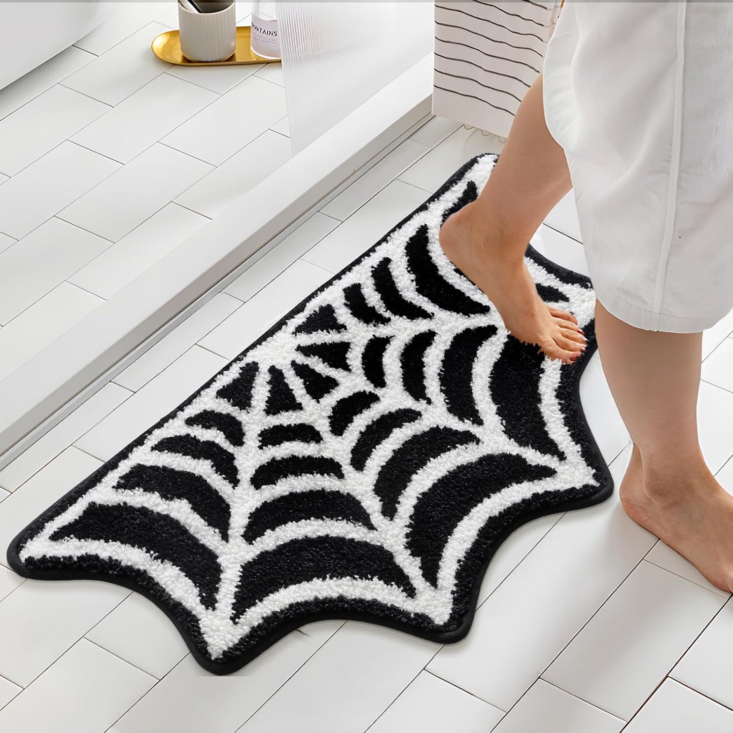 Alfombra baño tela araña 16x30pulg color negro antiderrap
