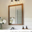 Lámpara baño 2 luces estilo granja vidrio ondas bronce