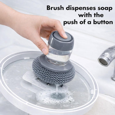 Cepillo para platos OXO con cepillo dispensador de jabón y raspador