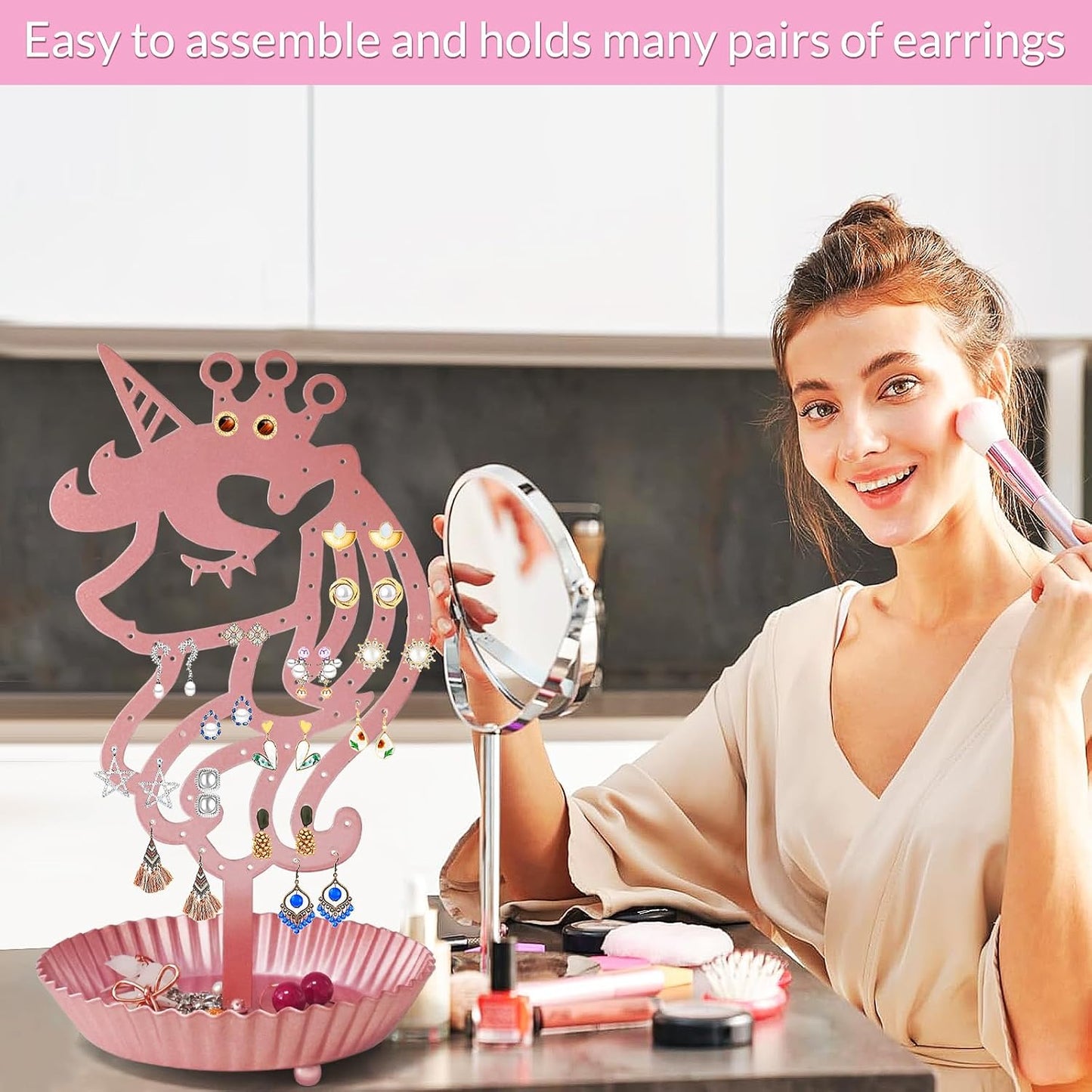 Organiz. aretes unicornio 81 agujeros soporte metal rosa