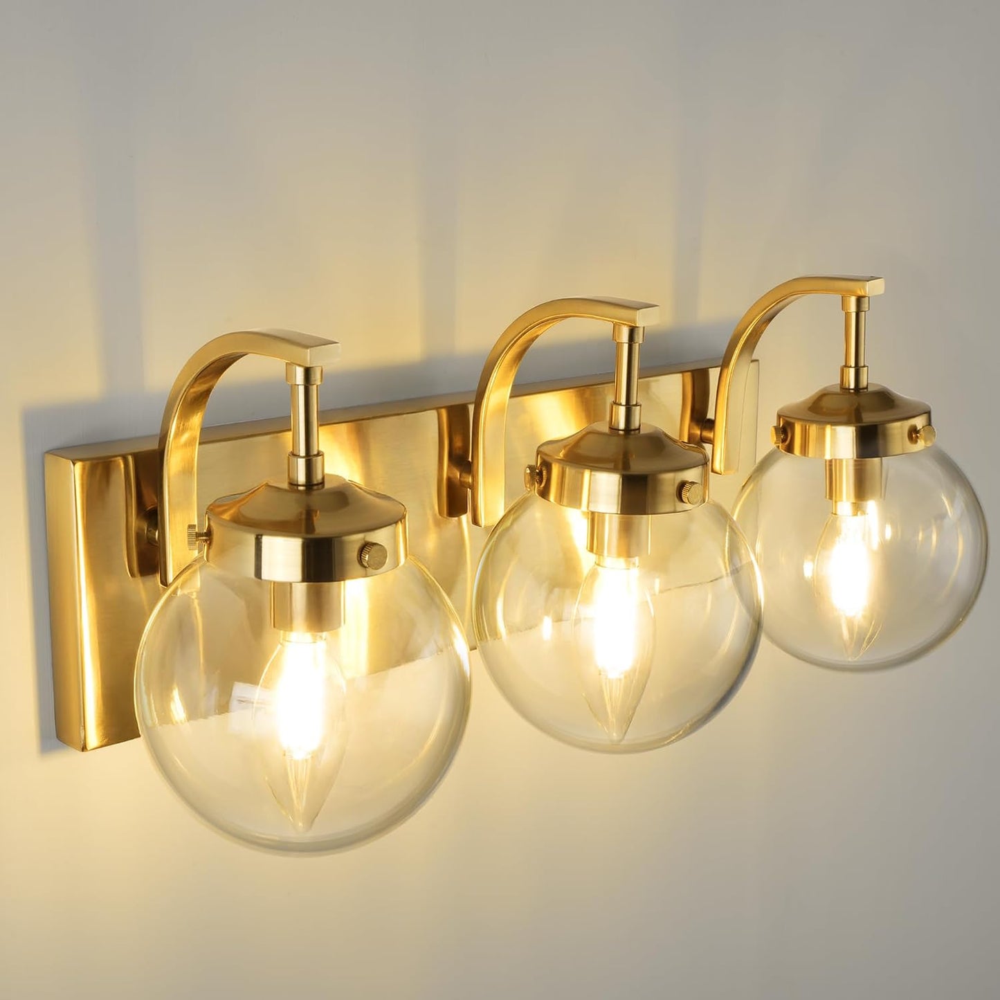 Lámpara tocador 3 luces color dorado vidrio transparente