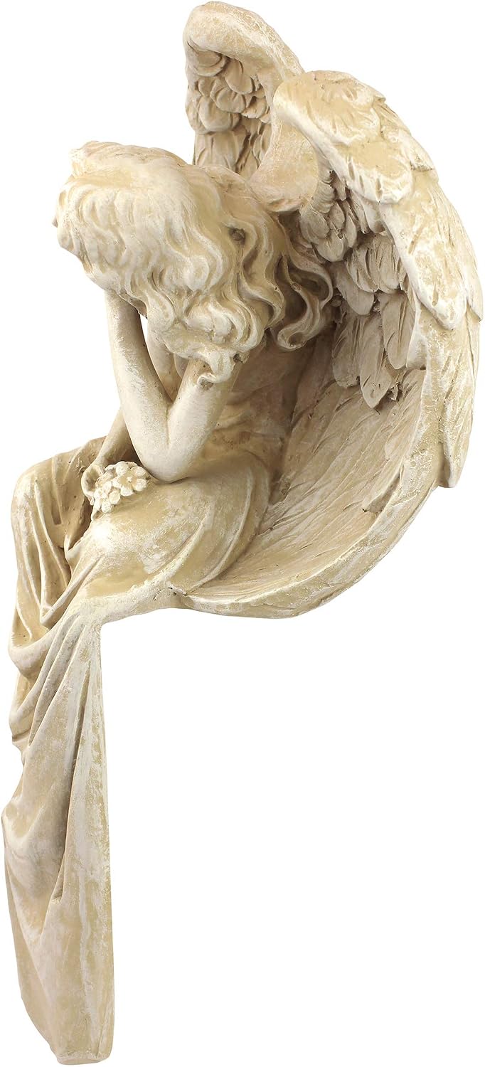 Estatua ángel gracia extendida