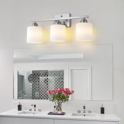 Luces baño acero inox sobre espejo enchufes E26 cerámica