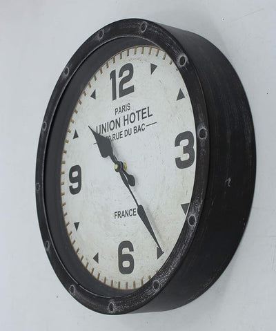 Reloj pared vintage Union Hotel París cara blanca