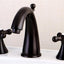 Grifo lavabo bronce aceitado mango cruzado metal