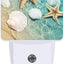 Luz nocturna enchufable con estrellas de mar y conchas marinas