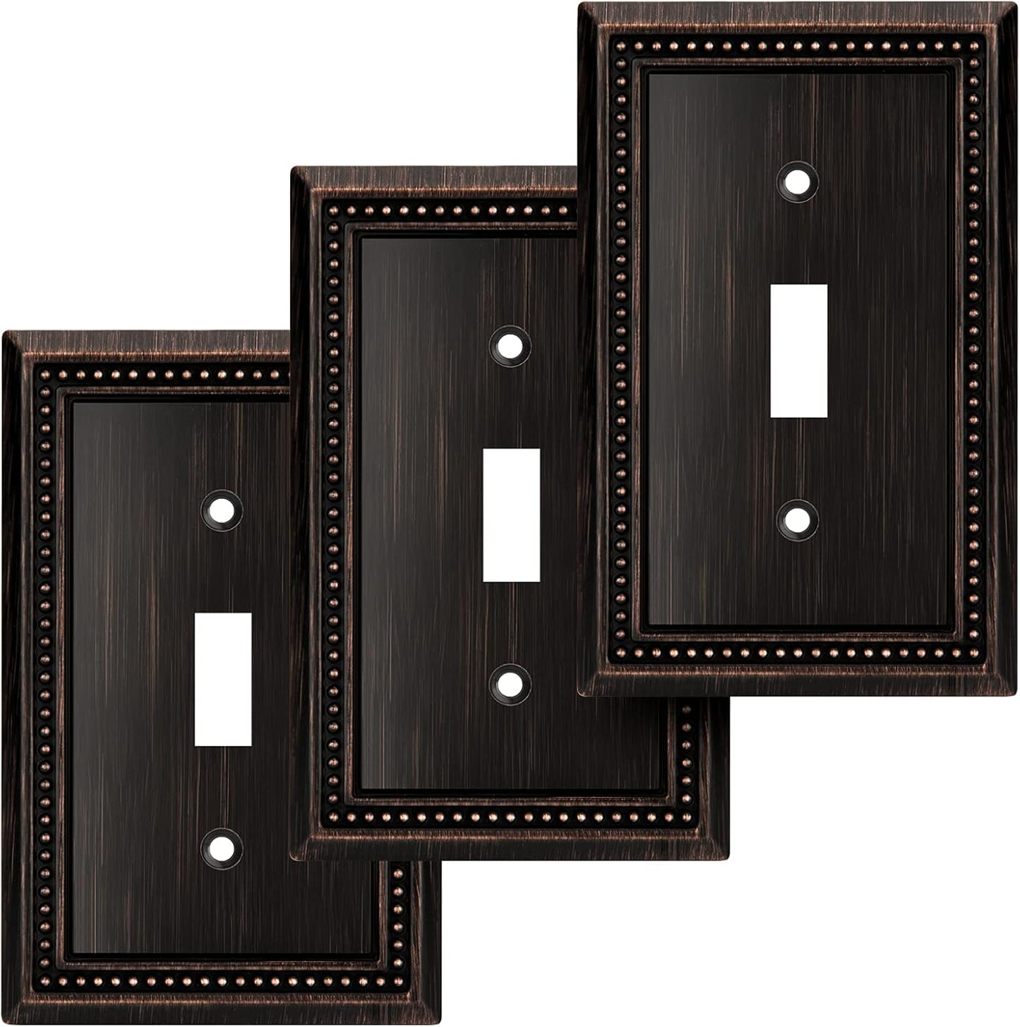 Placa decorativa interruptor bronce antiguo 3 pzas