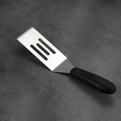 Espátula ranurada acero inox para sartén hierro fundido