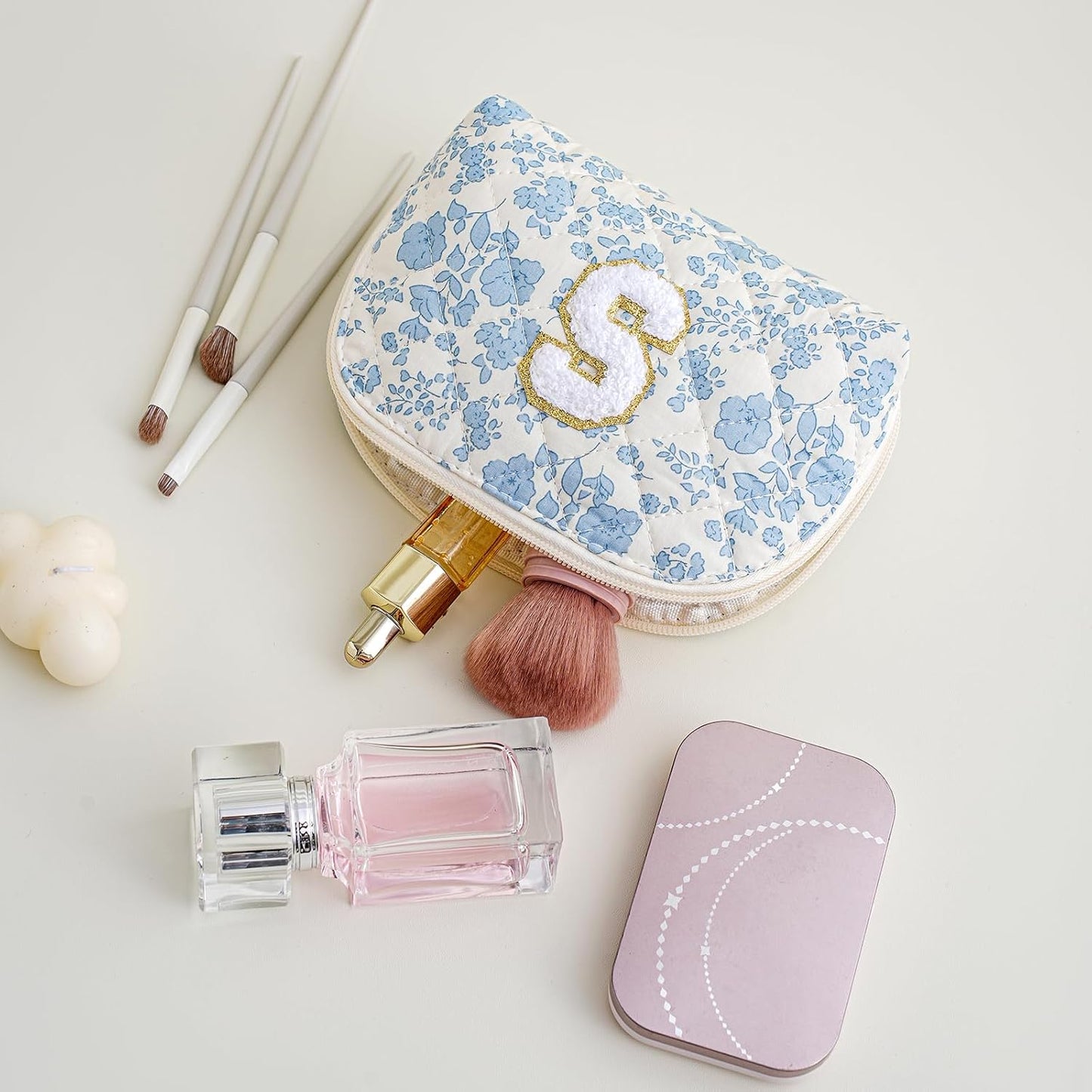Bolsa maquillaje alfabeto caracola coqueta floral azul