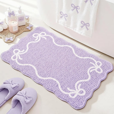 Alfombra baño lazo morado antideslizante 20x32pulg