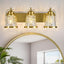 Lámpara tocador baño 3 luces dorada con accesorios cristal