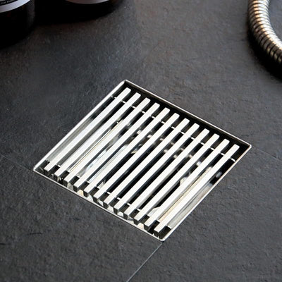 Drenaje ducha cuadrado 4pulg rejilla acero inox cepillado