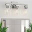 Lámpara baño níquel cepillado 3 luces cuadradas sobre espejo
