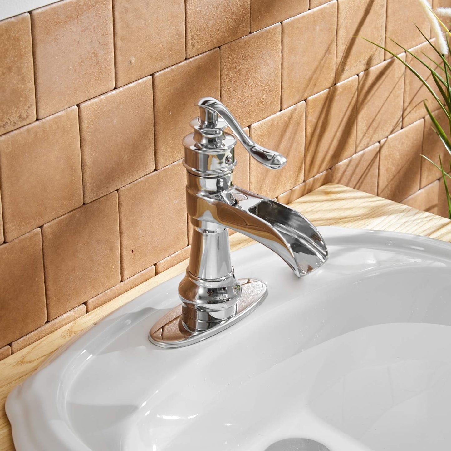 Grifo lavabo cromado plateado con tapón drenaje desplegable