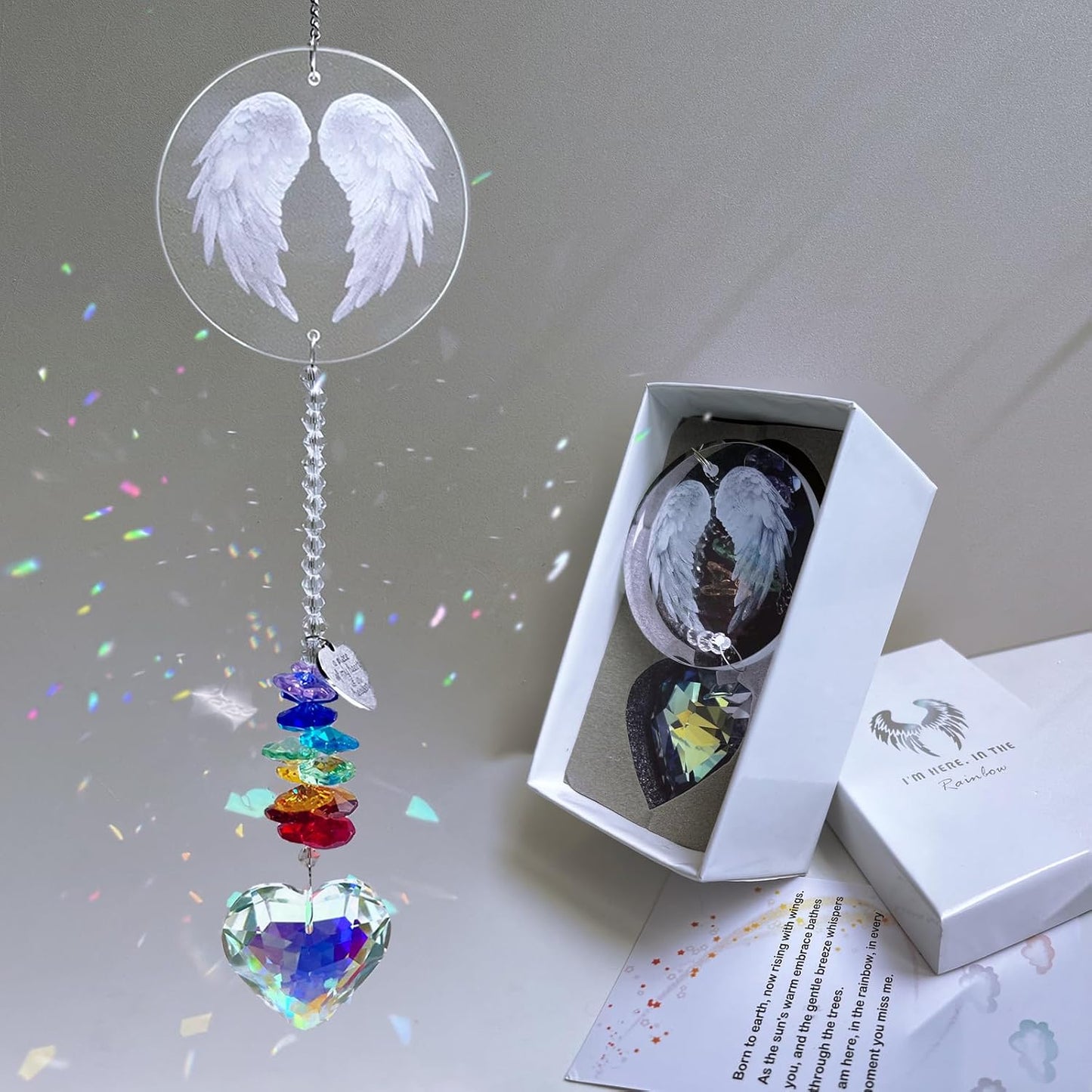 Atrapasoles de cristal con alas de ángel para duelo