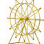 Decoración estantería dorada Art Deco sala chimenea
