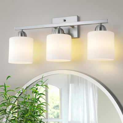 Luces baño acero inox sobre espejo enchufes E26 cerámica
