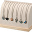 Soporte collar madera terciopelo beige para tienda