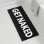 Alfombra baño texto Get Naked absorbente antiderrap