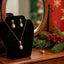 Soporte plegable terciopelo negro para collar y joyas