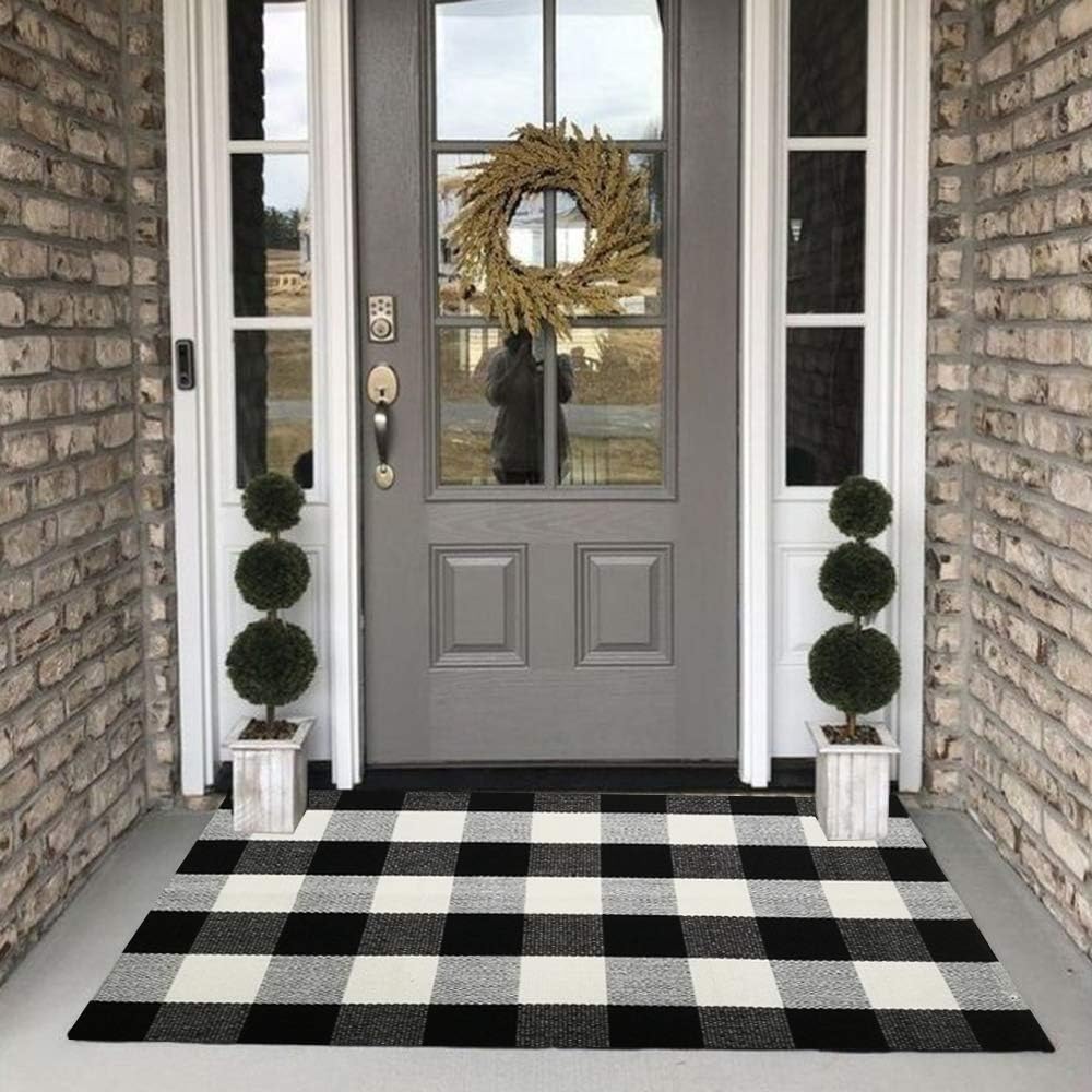 Alfombra cuadriculada lana 27.5x43pulg color blanco y negro