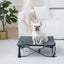 Cama elevada para perro portátil plegable con alfombrilla gris