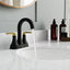 Grifo lavabo baño 4pulg 2 manijas 3 agujeros negro y dorado
