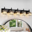 Lámpara tocad. baño cristal negro 5 luces moderna