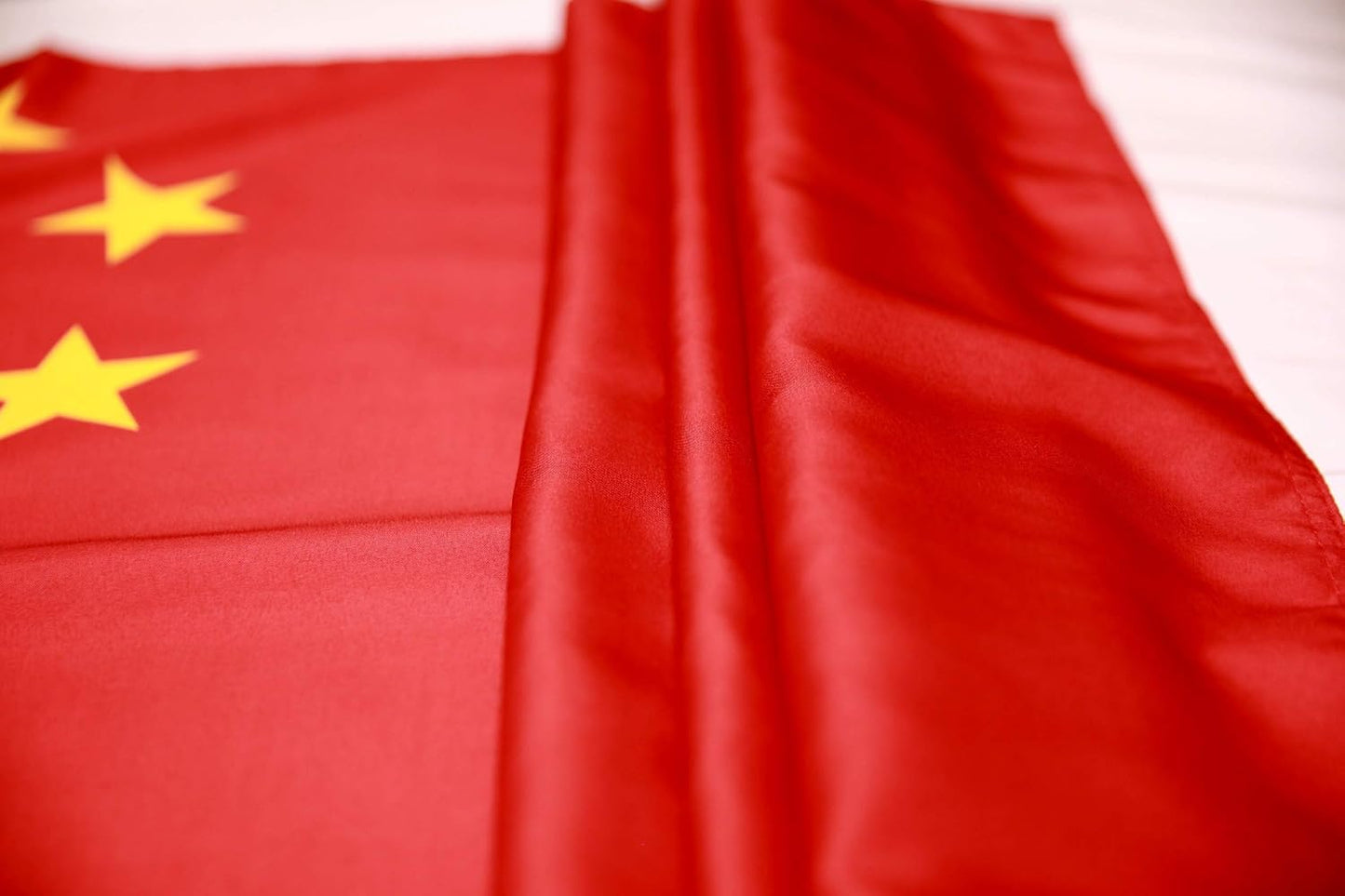 Bandera China 3x5 poliéster ojales latón doble costura