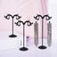 Soporte pendientes negro metal desmontable 3 pzas forma