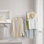 Estante para colgar ropa pared blanco