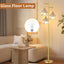Lámpara pie dorada 3 luces pantalla cristal sala dormitorio