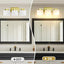 Lámpara baño 3 luces doradas pantalla vidrio moderna