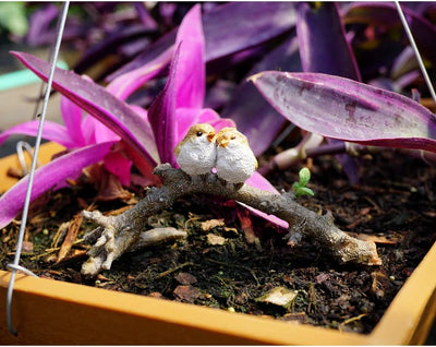 Estatua miniatura pájaros en rama para jardín de hadas