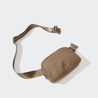 Riñonera nylon cremallera cintura ajustable mujer gris
