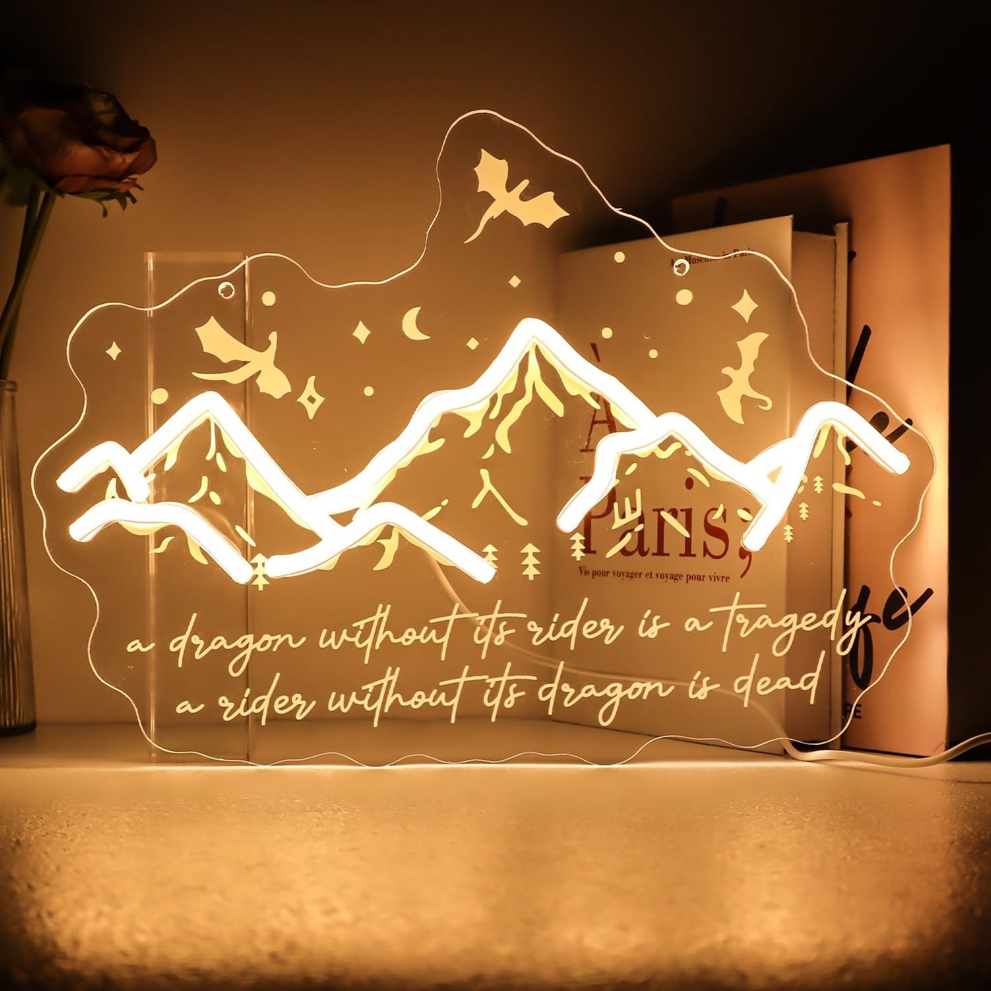 Letrero neón para amantes de libros con dragones