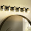 Lámpara baño 6 luces negras y doradas 38pulg apliques