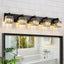 Lámpara baño cristal negro 5 luces sobre espejo