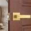 Palancas puerta doradas acabado latón satinado dormitorio