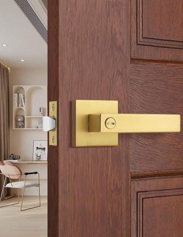 Palancas puerta doradas acabado latón satinado dormitorio