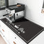 Tapete café absorbente 17x32pulg color negro