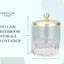 Tarro vidrio ondulado vertical con tapa metal dorado para baño