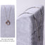 Soporte terciopelo gris para mostrar collares y pendientes