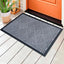 Tapete puerta antiderrap impermeable 24x36" gris