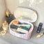 Bolsa maquillaje púrpura acolchada con flores suave coquette