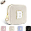 Bolsa maquillaje pana beige hebilla anillo monograma
