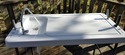 Mesa limpieza peces caza con fregadero patas plegables