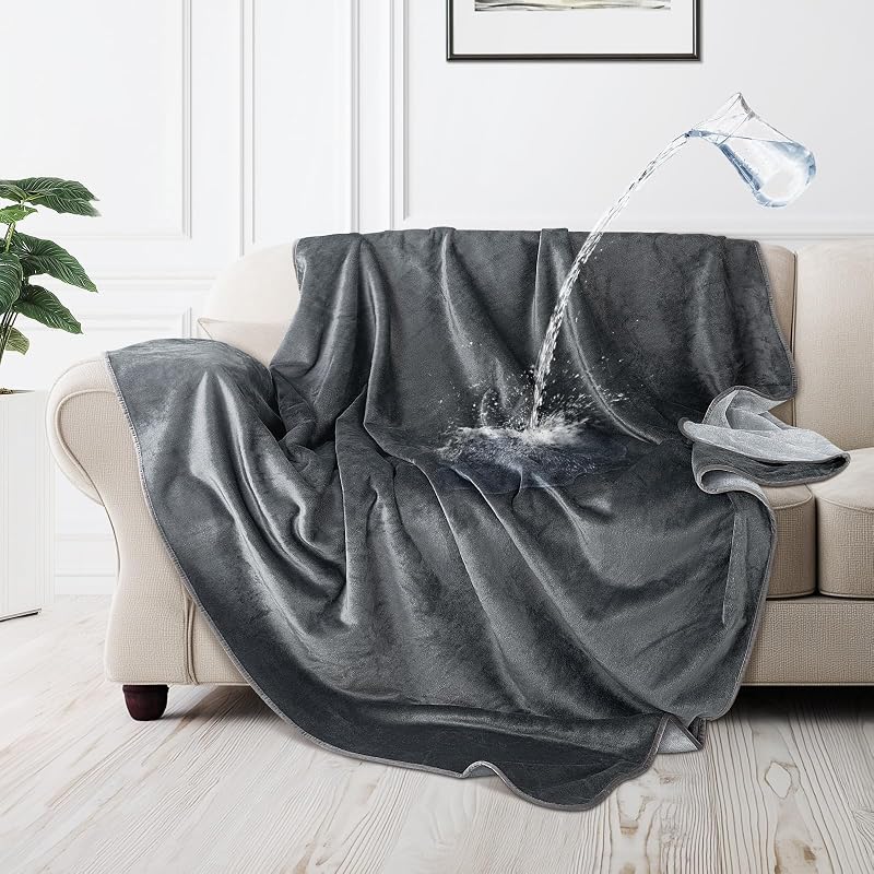 Manta impermeable reversible franela perros 50x60pulg gris