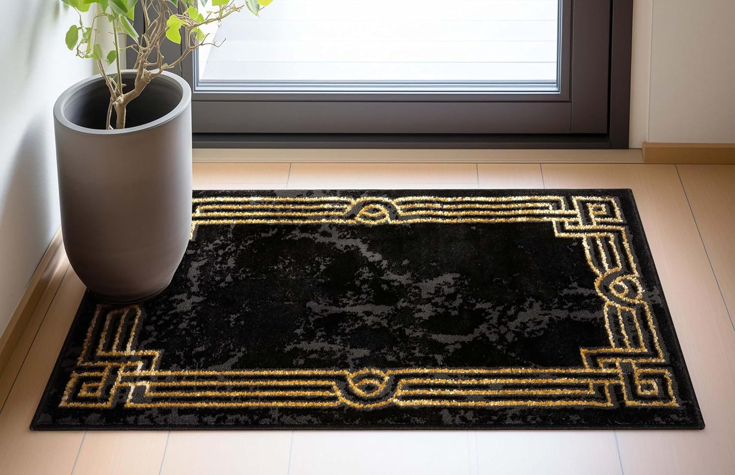 Alfombra abstracta 2x3ft borde mármol negro y dorado