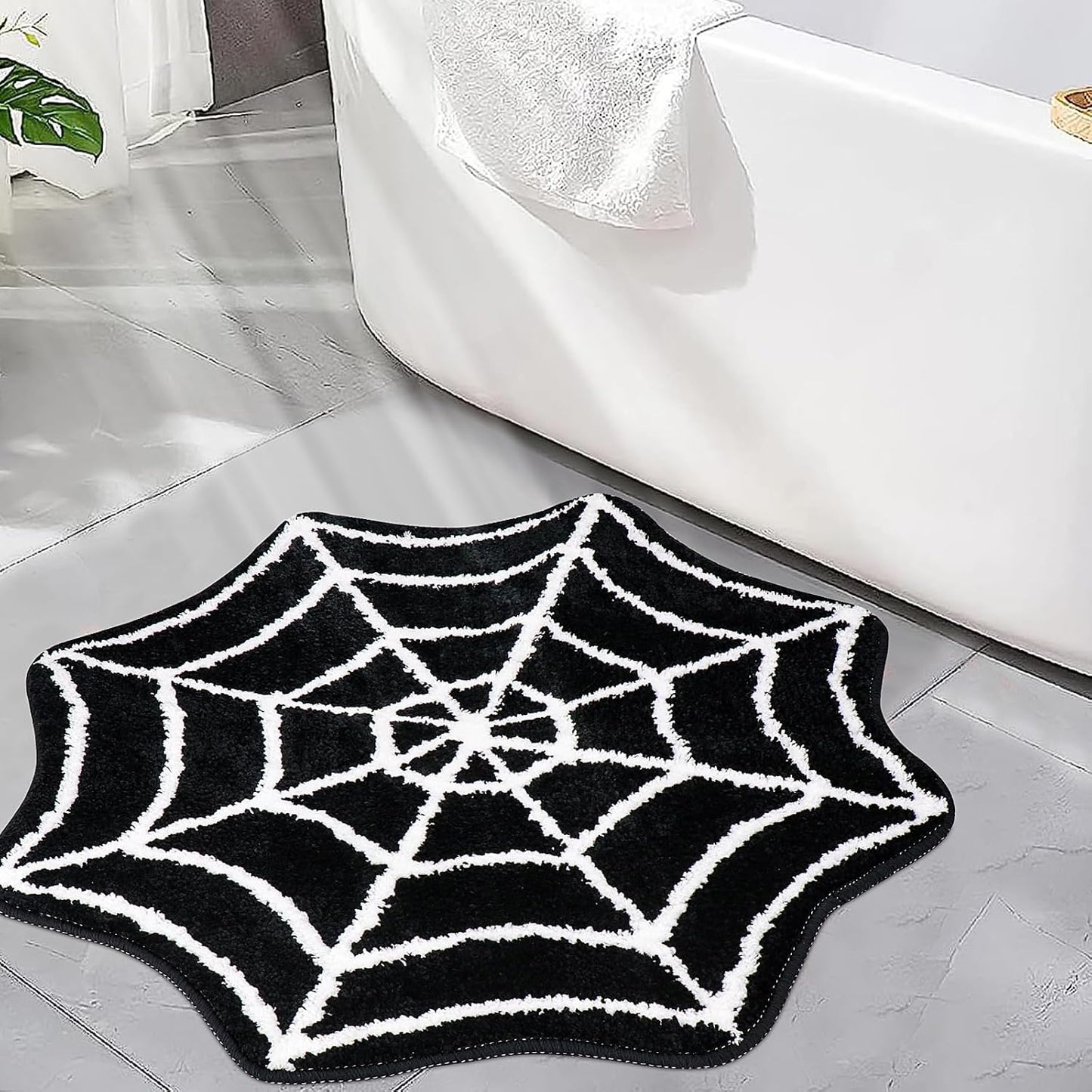 Tapete baño telaraña antiderrap 31x20" negro y blanco